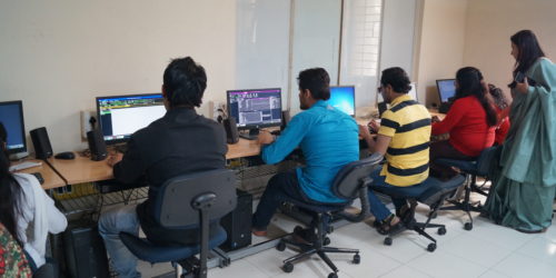 Computer trainees working in the computer lab of the Association