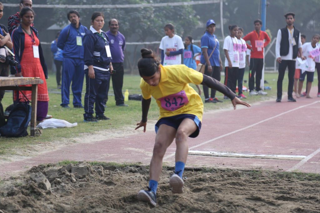 A blind girl participating in long jump