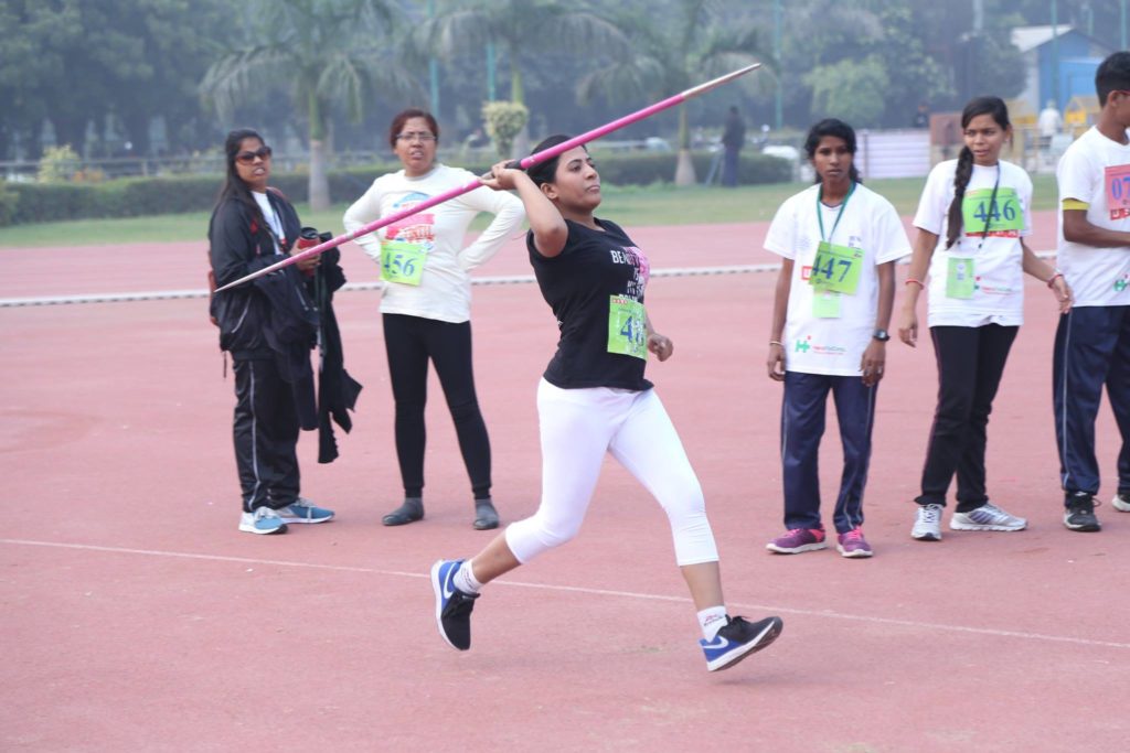 A blind athlete throwing the javelin