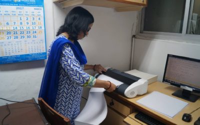 A staff of the Association gets material printed in Braille